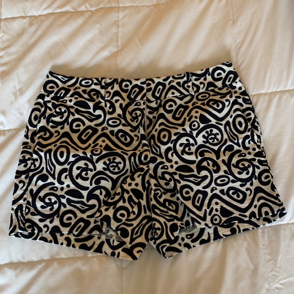 white and navy patterned shorts
